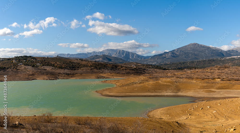 view of Lake Vinuela in the backcountry mountains of Malaga Province in southern Spain