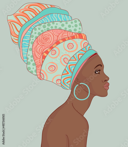 Portrait of beautiful African woman with earring (profile view)