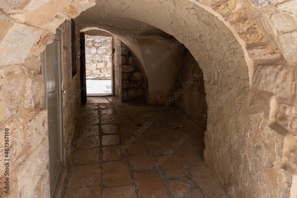 Tunnel  under the building leading from the small Feodorovsky monastery in Christian quarters in the old city of Jerusalem, Israel