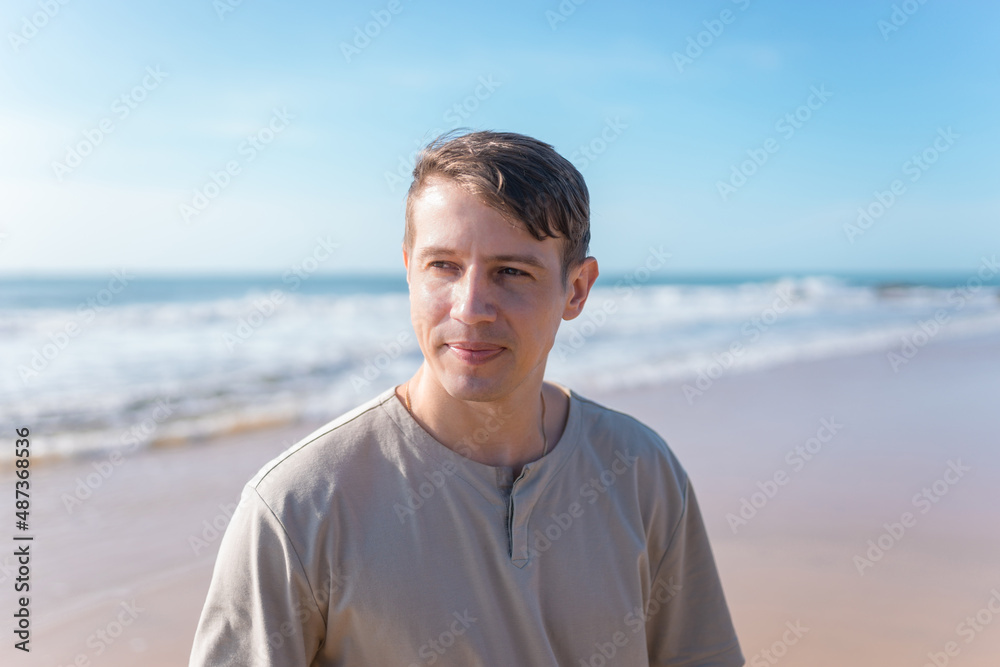 Close up portrait of attractive young caucasian man in casual clothing Close up portrait of attractive young caucasian man in casual clothing