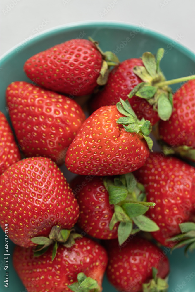 Ripe red strawberries on a plate Ripe red strawberries on a plate