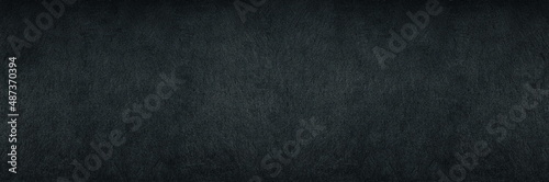 Black shale wide panoramic texture. Dark grey gloomy grunge abstract widescreen banner background photo
