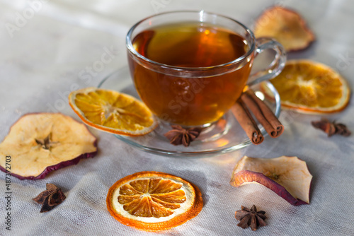 Cup of tea and slices of dried orange
