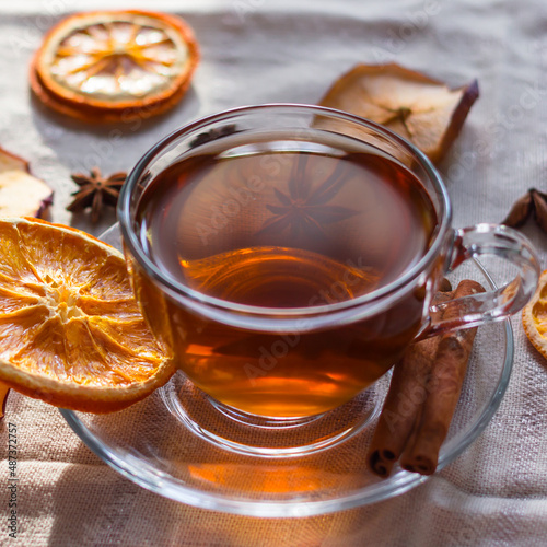 Cup of tea and slices of dried orange