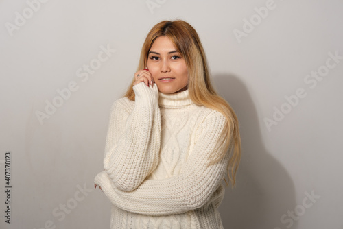 Asian woman on a gray background