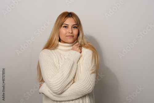 Asian woman on a gray background