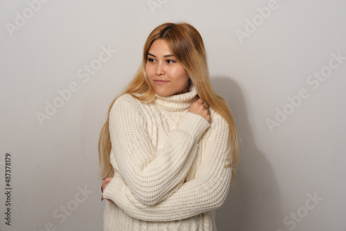 Asian woman on a gray background