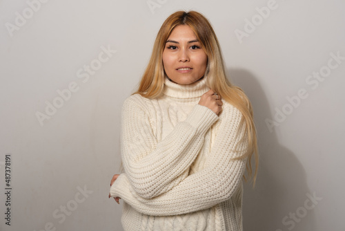Asian woman on a gray background