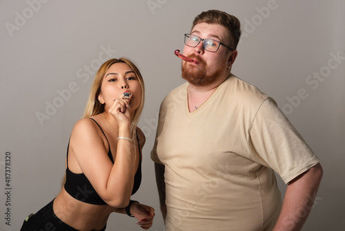 Man and woman congratulate