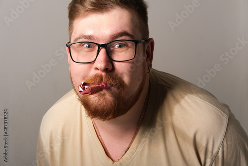 A man blows a pipe, a holiday