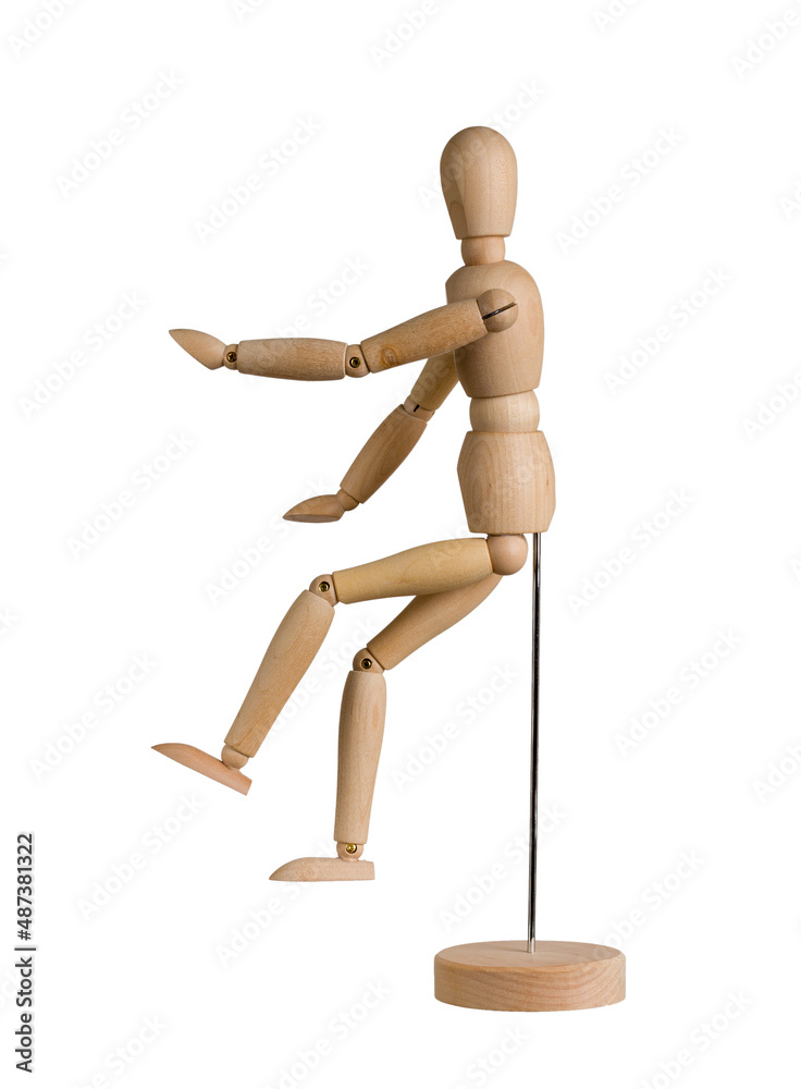 wooden mannequin with bent arms and legs on stand isolated on white background wooden mannequin with bent arms and legs on stand isolated on white background