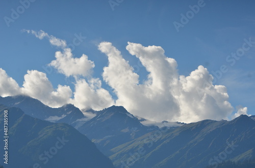 clouds over the mountains. mountain with clouds in a sunny day 