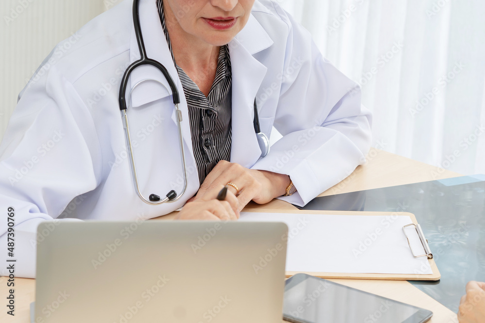 Sick woman in with caucasian doctors, health check, health insurance. Sick woman in with caucasian doctors, health check, health insurance.