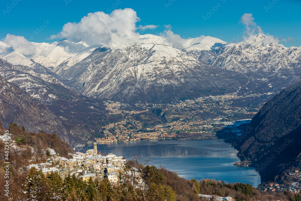 Winter landscape of the Alps and Lake Lugano from the Intelvi Valley. Location Ramponio. Province of Como. Lombardy. Italy