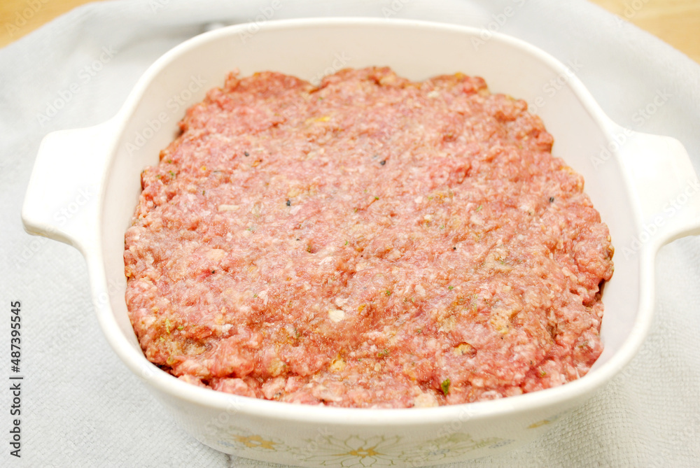 Raw Meatloaf in a Baking Dish Ready to Be baked Raw Meatloaf in a Baking Dish Ready to Be baked