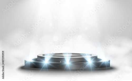 	
Round podium, pedestal or platform, illuminated by spotlights in the background. Vector illustration. Bright light. Light from above. Advertising place	
