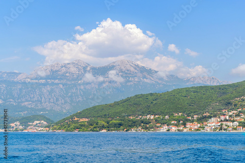 Scenic panoramic landscape view on Bay of Kotor, Montenegro with mountains at sundown. © jukovskyy
