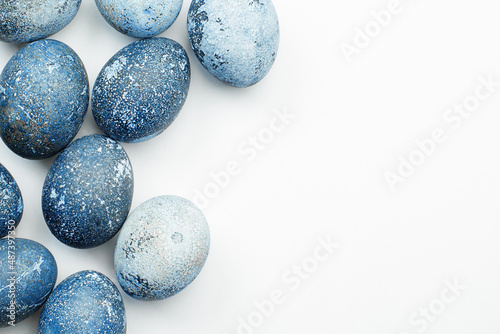 Photography blue easter eggs on a light background