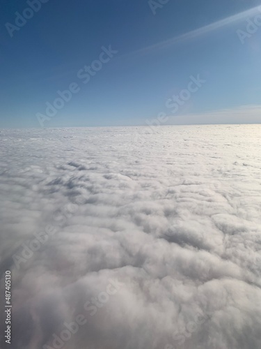 view of the clouds from the window of an airplane
