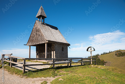 small wooden chapel at Kampenwand mountain, wayside cross, meditational place upper bavaria photo