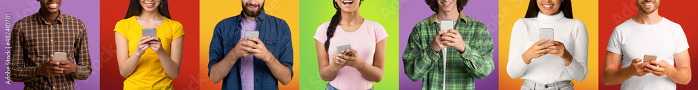 Cropped glad millennial international people in casual chatting and typing on smartphones Cropped glad millennial international people in casual chatting and typing on smartphones