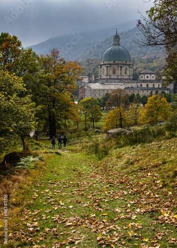 Scenic path in the woods leading to Oropa sanctuary, Piedmont, Italy