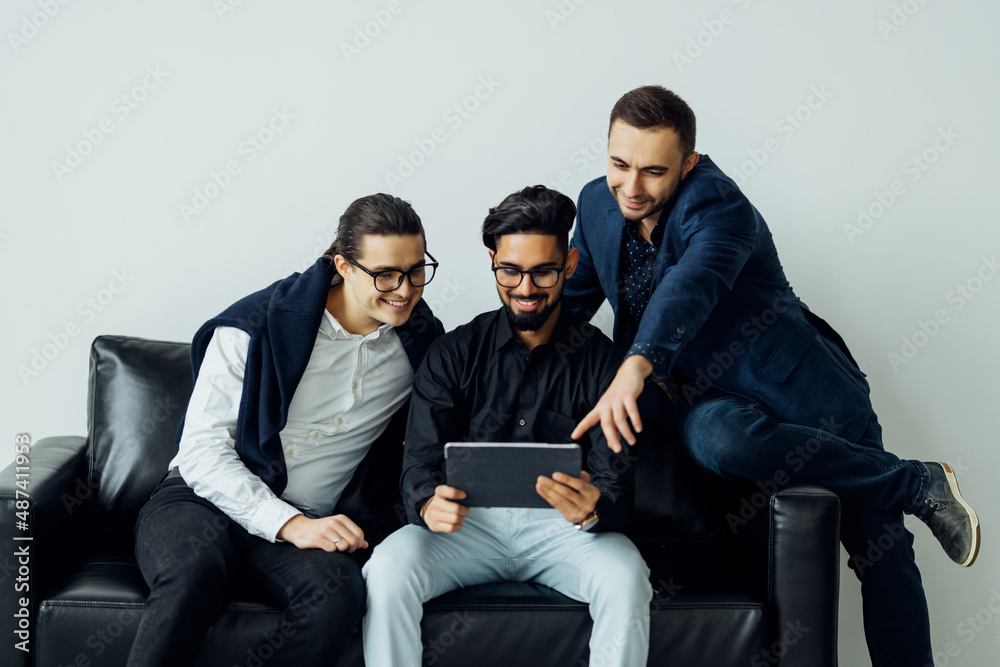 Young work team having a meeting together in office Young work team having a meeting together in office