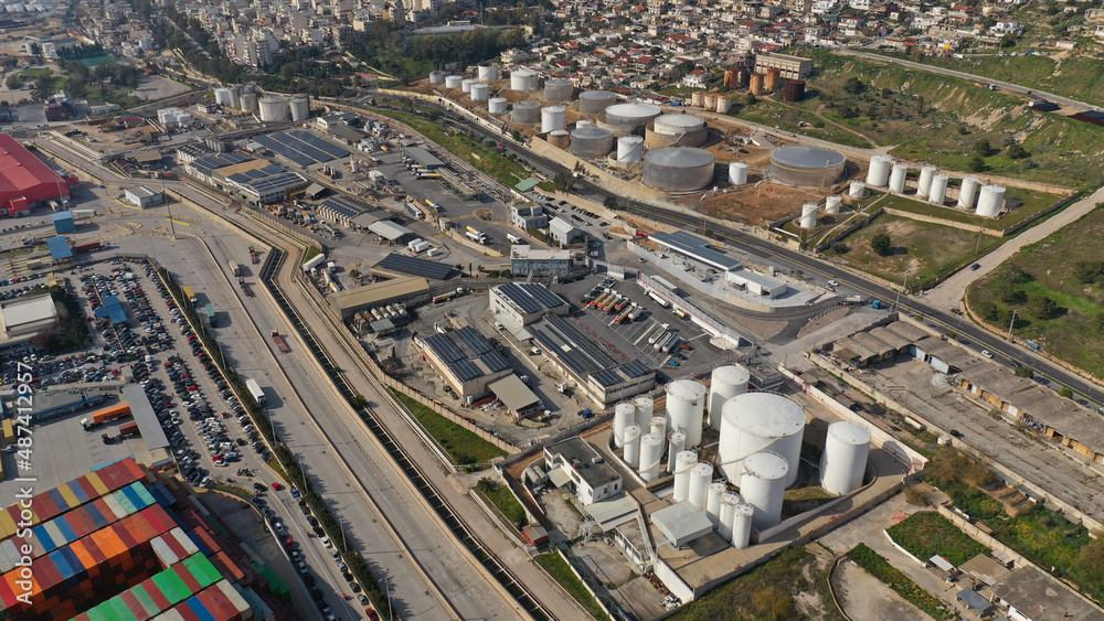 Fototapeta premium Aerial drone photo of huge crude oil tanks near oil refinery plant