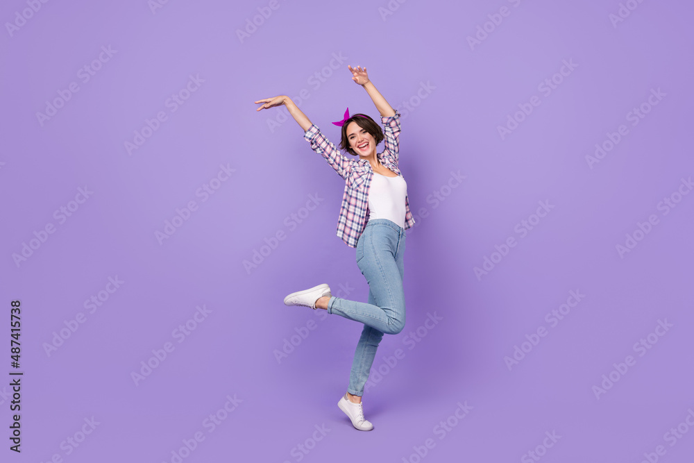 Full size profile side photo of young pretty lady playful dancing free-time isolated over purple color background