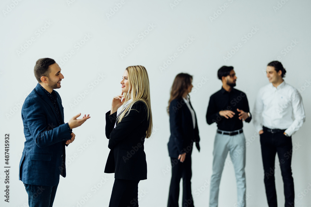 Obraz premium Group of business people discussing document on a meeting in the modern office.