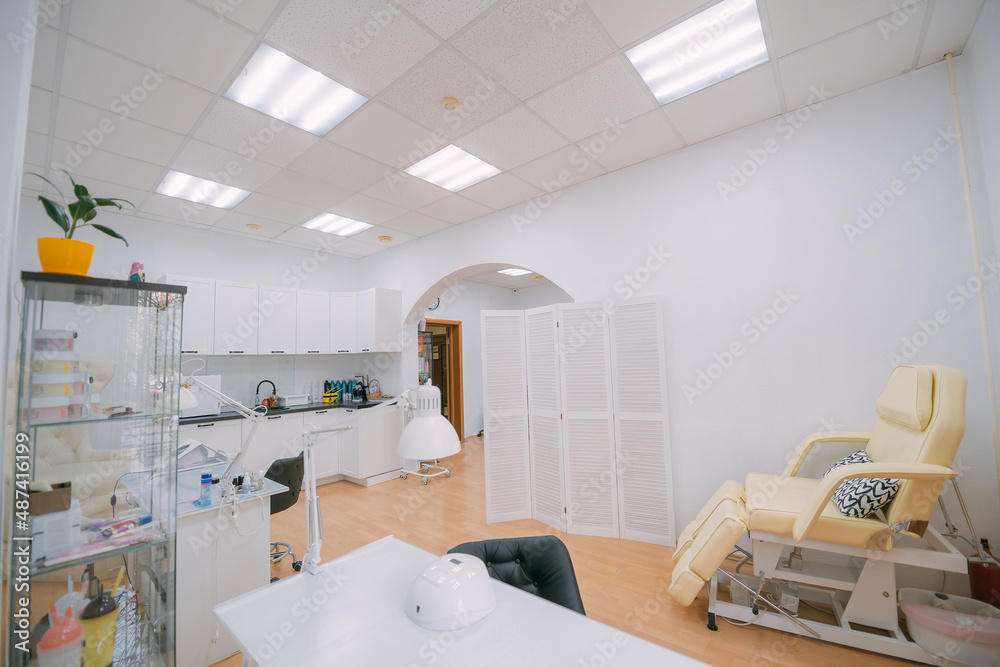 The interior of the nail salon without people. A bright, modern salon for the care of nails The interior of the nail salon without people. A bright, modern salon for the care of nails