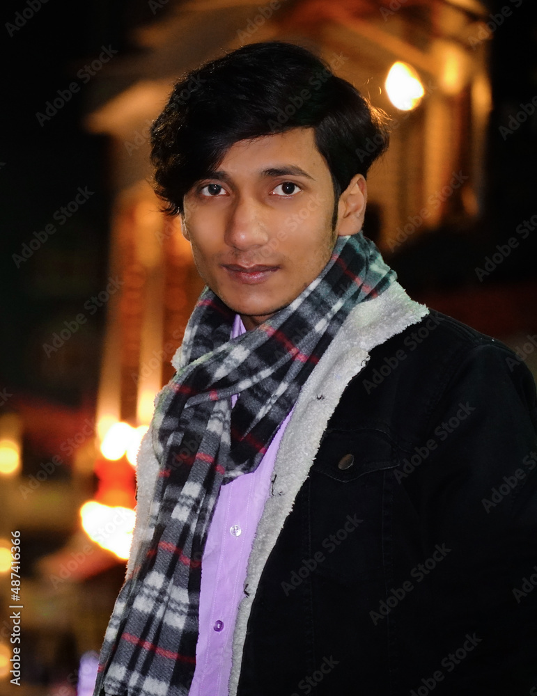 indian man looking at camera at night mode indian man looking at camera at night mode