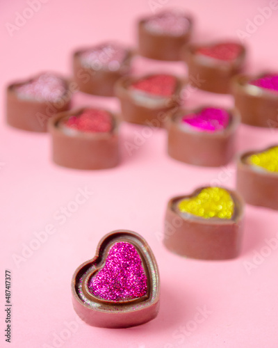 Chocolate bonbons in the shape of hearts.