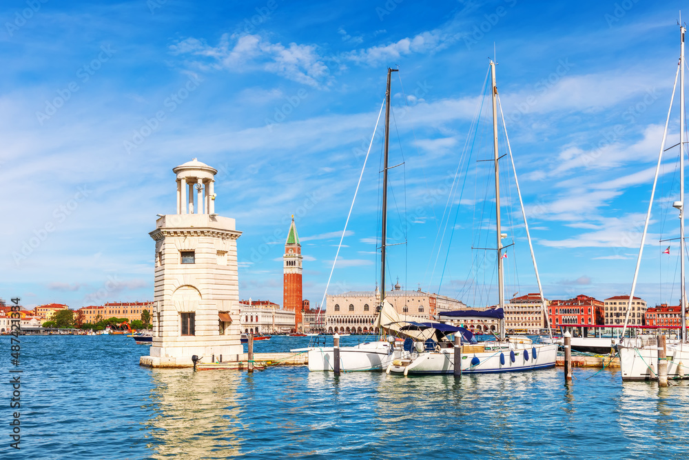 Lagoon of Venice, lighthouse and boats, beautiful italian view