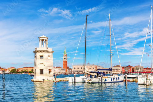 Lagoon of Venice, lighthouse and boats, beautiful italian view