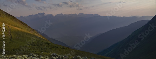 Mountain valley in Svaneti at sunset. At the foot of Mount Ushba. View of the village of Mazeri. Georgia. photo