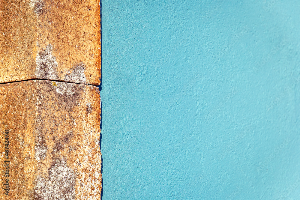 Tourquoise cyan blue wall texture with stone siding Tourquoise cyan blue wall texture with stone siding
