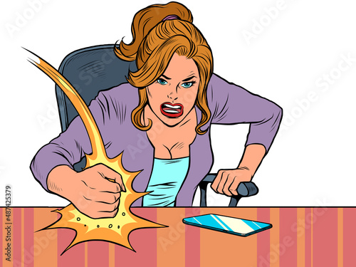 The evil businesswoman boss hits the table with his fist. Emotions in the office. Angry boss