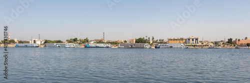 Luxor, Egypt - September 21, 2021: Cruise ships on Nile river, River cruising is a comfortable, luxury hotel-style way, Luxor, Egypt