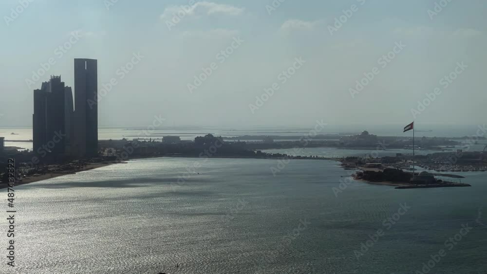 Aerial Timelapse high view of Abu Dhabi city (UAE) - Downtown Abu Dhabi landmarks - corniche road and beach Aerial Timelapse high view of Abu Dhabi city (UAE) - Downtown Abu Dhabi landmarks - corniche road and beach