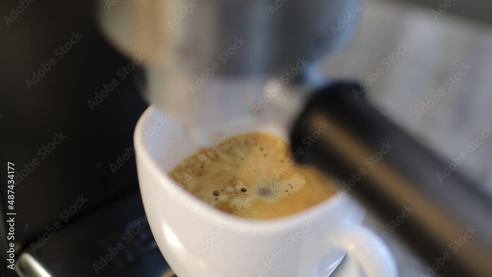 preparation of espresso coffee in a carob coffee maker, fresh coffee in a coffee machine. preparation of espresso coffee in a carob coffee maker, fresh coffee in a coffee machine.