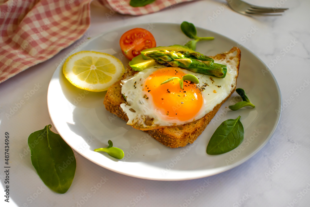 sandwich with egg, avocado, asparagus on old background sandwich with egg, avocado, asparagus on old background