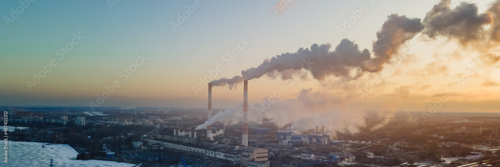 Fototapeta premium Industrial factory pollution, smokestack exhaust gases. Industry zone, thick smoke. Climate change and global warming. Wide banner