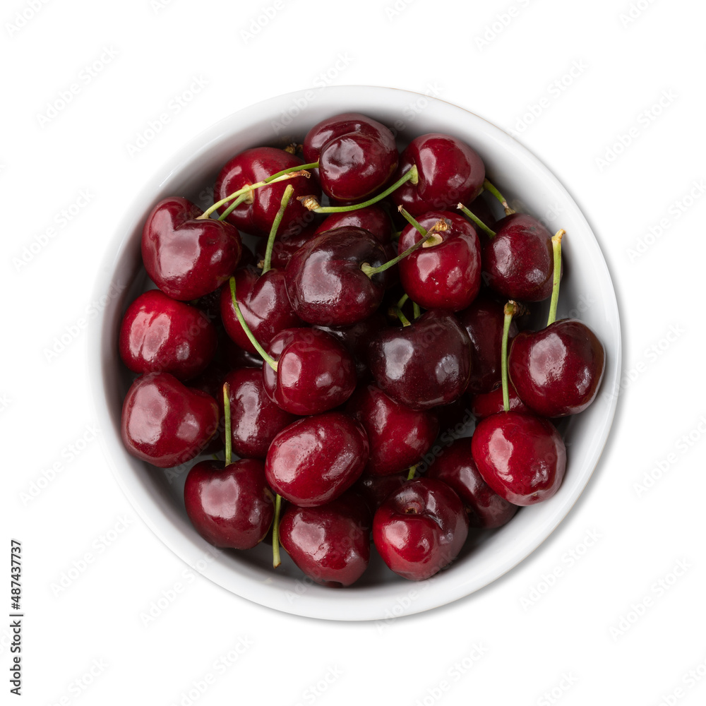 Red cherries on a bowl isolated over white background Red cherries on a bowl isolated over white background