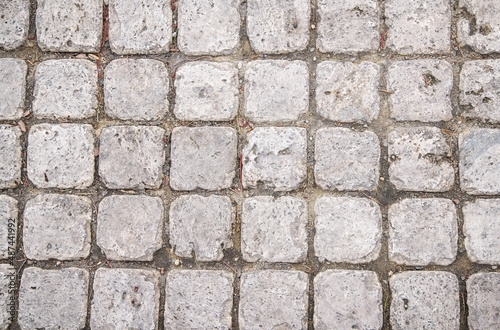 Old paving stones texture.. Stone wall texture.