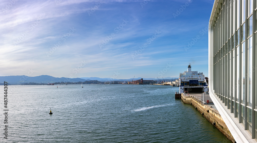 view of downtown city harbor seafront and Freight and passenger sea ferry bound for Britain. Santander, Cantabria, Spain view of downtown city harbor seafront and Freight and passenger sea ferry bound for Britain. Santander, Cantabria, Spain