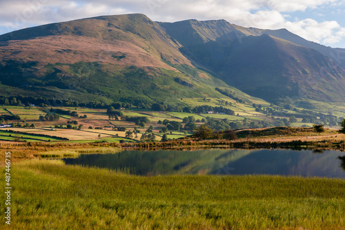 Tewet Tarn and beyond, across the Greta Valley, Blencathra, near Keswick, Lake District, Cumbria, UK, on a peaceful early Summer's morning