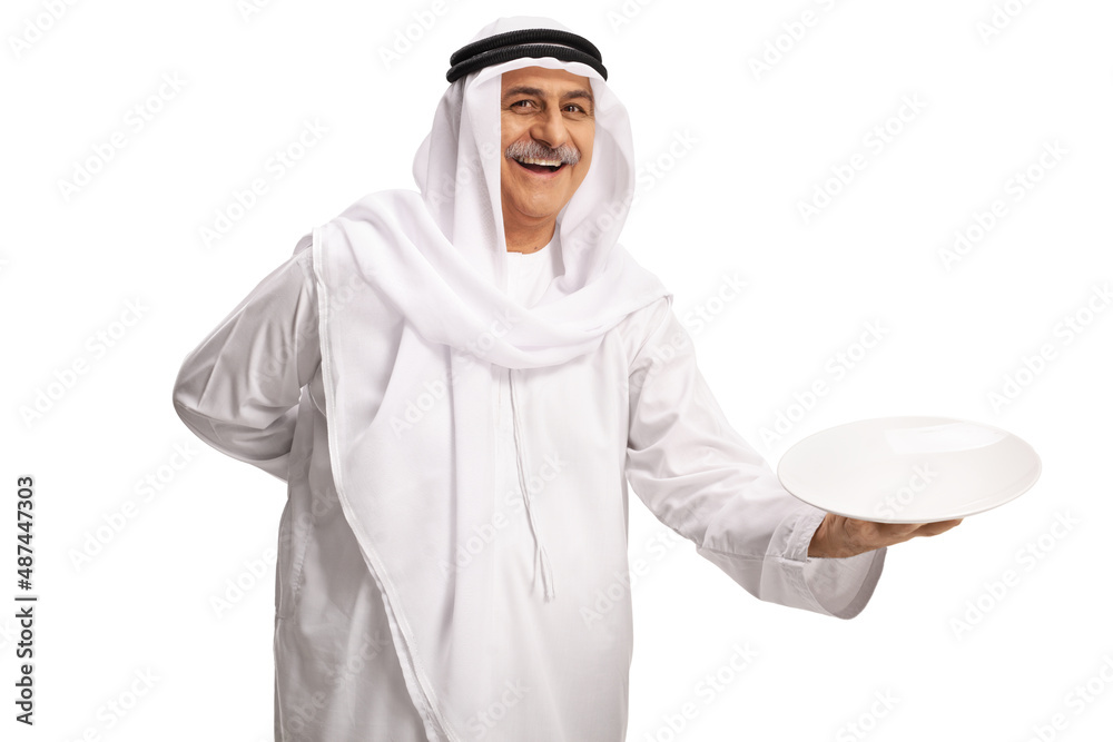 Mature arab man holding an empty plate and smiling Mature arab man holding an empty plate and smiling