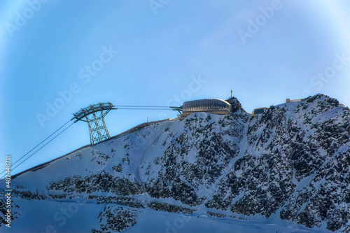 Ski lift at snow covered hills of Soelden, Austria. photo