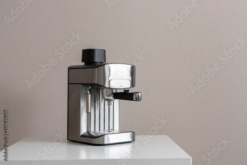 Wallpaper Mural classic metal automatic coffee machine at home on the table Torontodigital.ca
